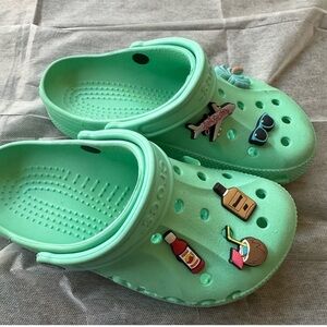 Teal Crocs with 6 charms